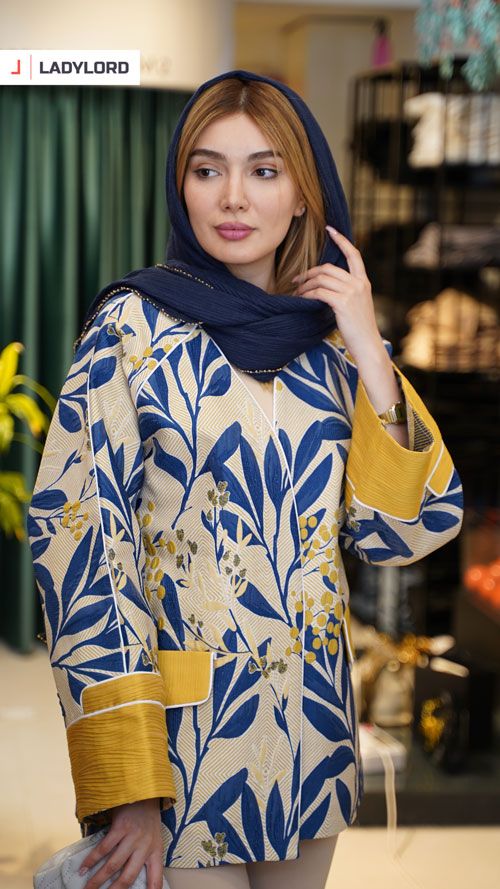 برای بزرگنمایی تصویر دوبار کلیک نمایید مانتو زنانه ژاکارد طرح انگور کد 0021 رنگ آبی