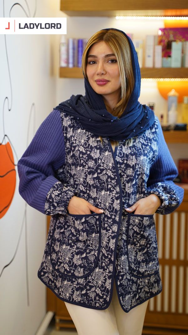 برای بزرگنمایی تصویر دوبار کلیک نمایید مانتو زنانه طرح کوک دوزی آستین کش دار