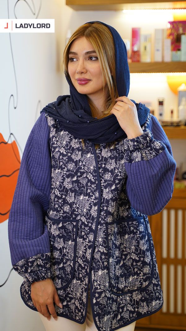 برای بزرگنمایی تصویر دوبار کلیک نمایید مانتو زنانه طرح کوک دوزی آستین کش دار