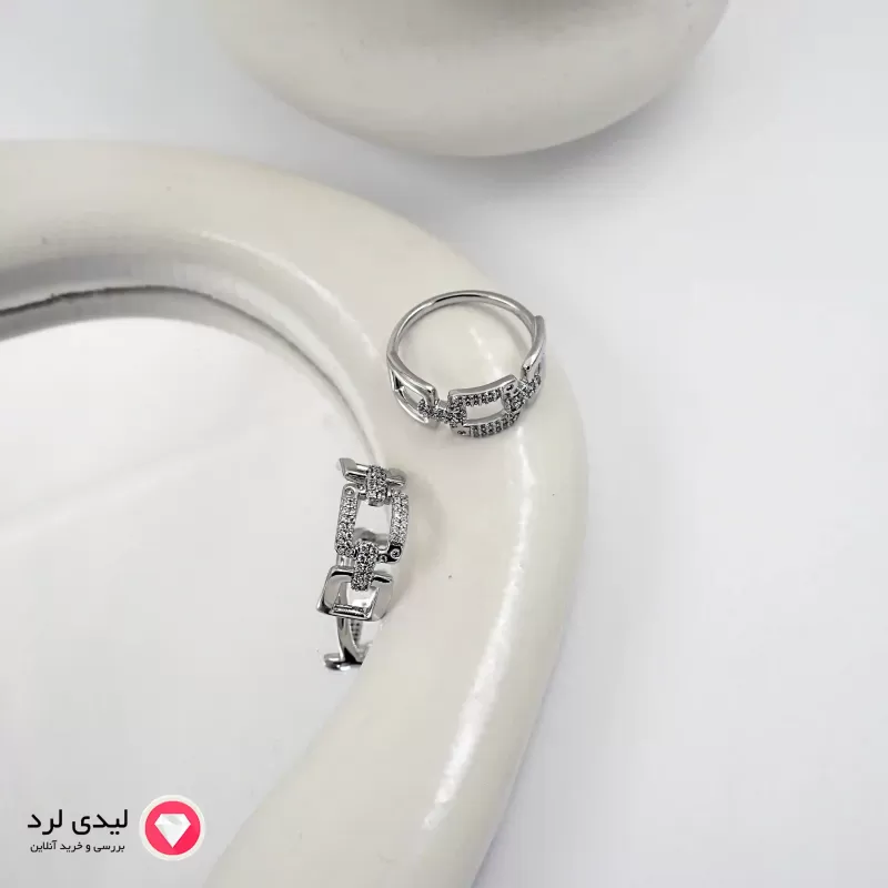 برای بزرگنمایی تصویر دوبار کلیک نمایید انگشتر ژوپینگ استیل با طراحی هندسی و نگینکاری کد 12140