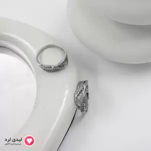 انگشتر ژوپینگ نقره‌ای با طراحی بافته و نگین‌کاری ظریف کد 12630